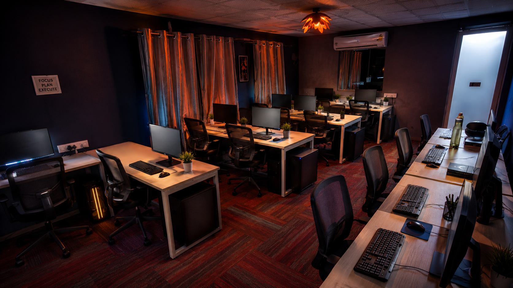 TopVFX modern studio facility in Chennai with artists at production workstations